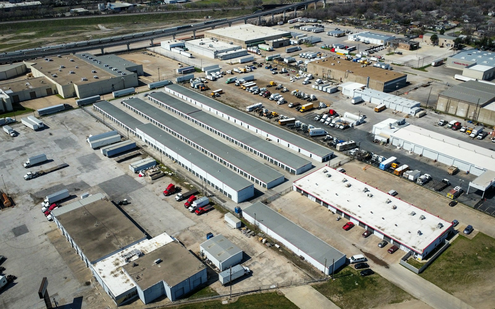 Aerial view of a large industrial and commercial property campus.